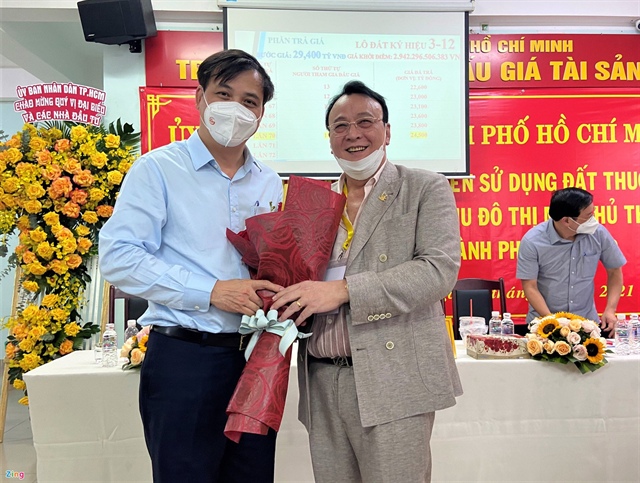 Cái mất của Tân Hoàng Minh sau khi bỏ cọc lô đất đấu giá ở Thủ Thiêm ảnh 1