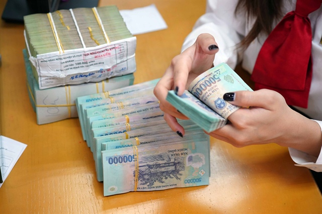 Đề nghị bổ sung thanh toán chuyển nhượng bất động sản qua ngân hàng vào luật - ảnh 1