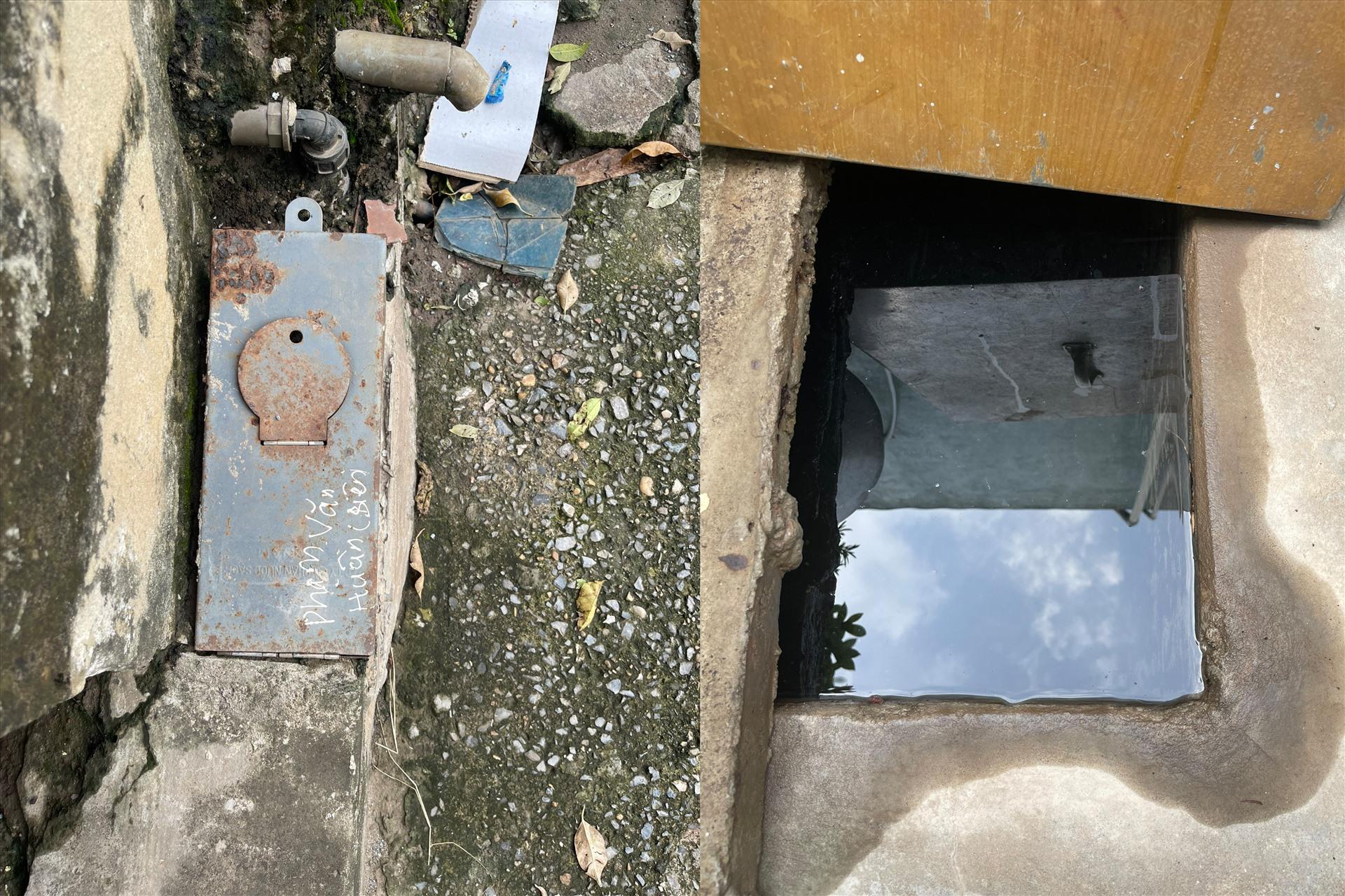 Đồng hồ nước và bể chứa nước nhà ông T. Ảnh: NVCC