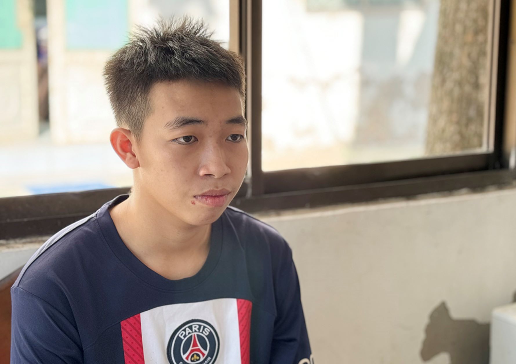 Đối tượng Nguyễn Thành Nam tại thời điểm bị khởi tố. Ảnh: Vũ Tiến
