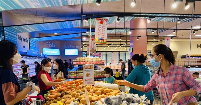 Nhiều ý kiến cho rằng mức giảm trừ gia cảnh mới cần được áp dụng ngay cho năm nay chứ không nên chờ đến năm 2026. Ảnh: MINH TRÚC