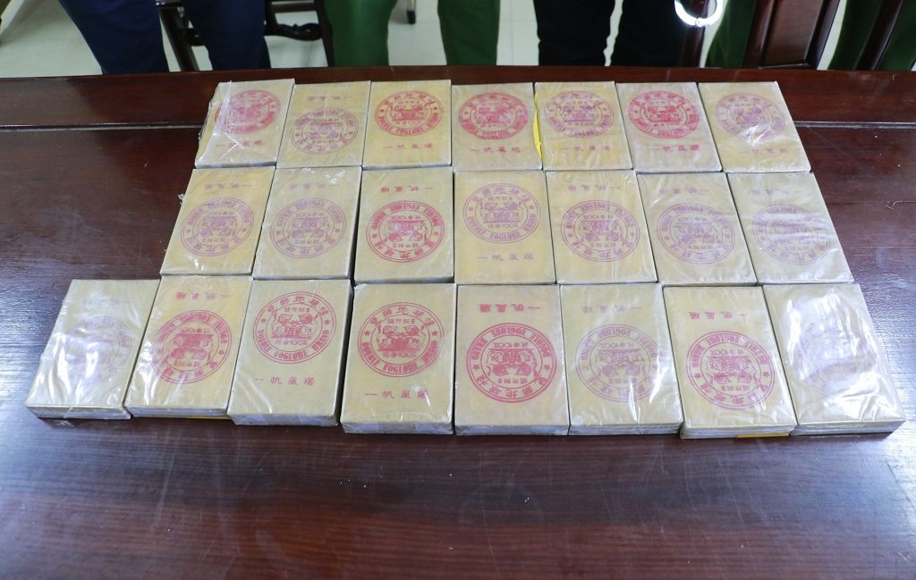 Tang vật 22 bánh ma túy bị lực lượng chức năng thu giữ trong chuyên án. Ảnh: Hồ Hưng